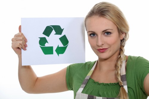 Clean and organized waste disposal area with skips